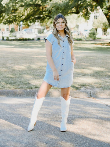 light wash button up collared short sleeve denim dress with bone knee high cowgirl boots
